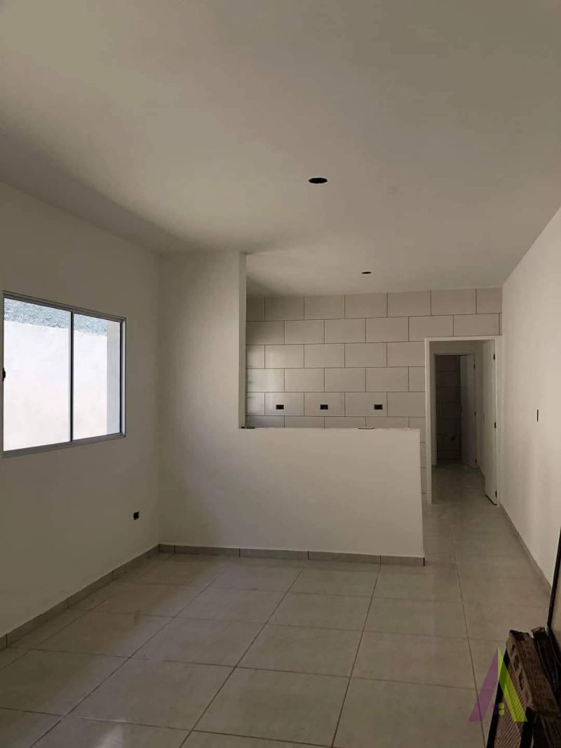 Casa geminada térrea 