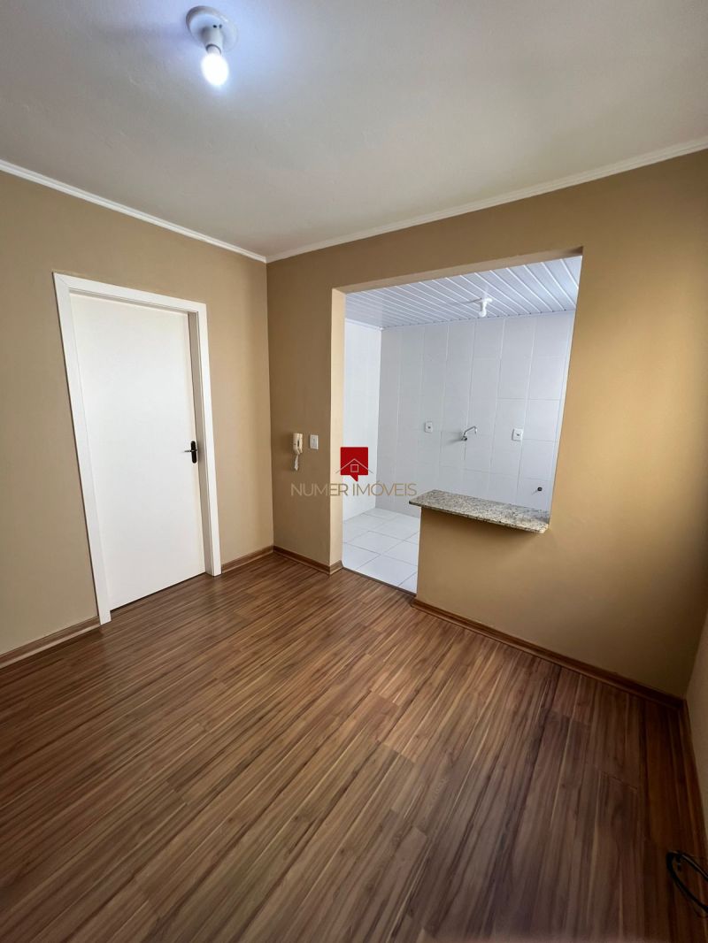 APARTAMENTO NO CENTRO COM GARAGEM 