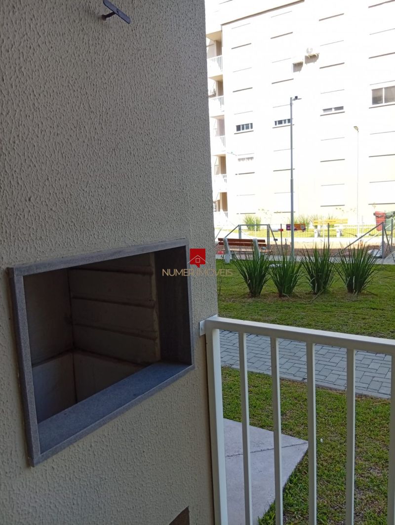 APARTAMENTO COM SACADA E CHURRASQUEIRA