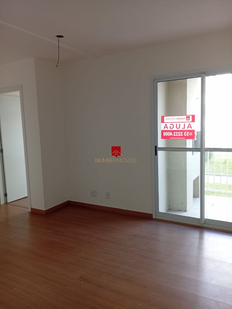 APARTAMENTO COM SACADA E CHURRASQUEIRA