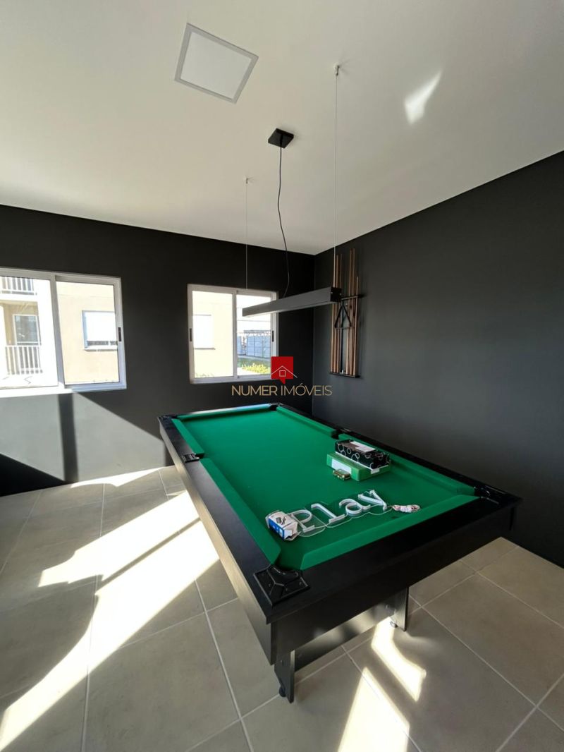 APARTAMENTO COM SACADA E CHURRASQUEIRA