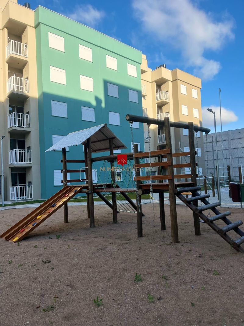 APARTAMENTO COM SACADA E CHURRASQUEIRA