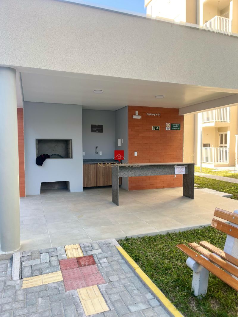 APARTAMENTO COM SACADA E CHURRASQUEIRA