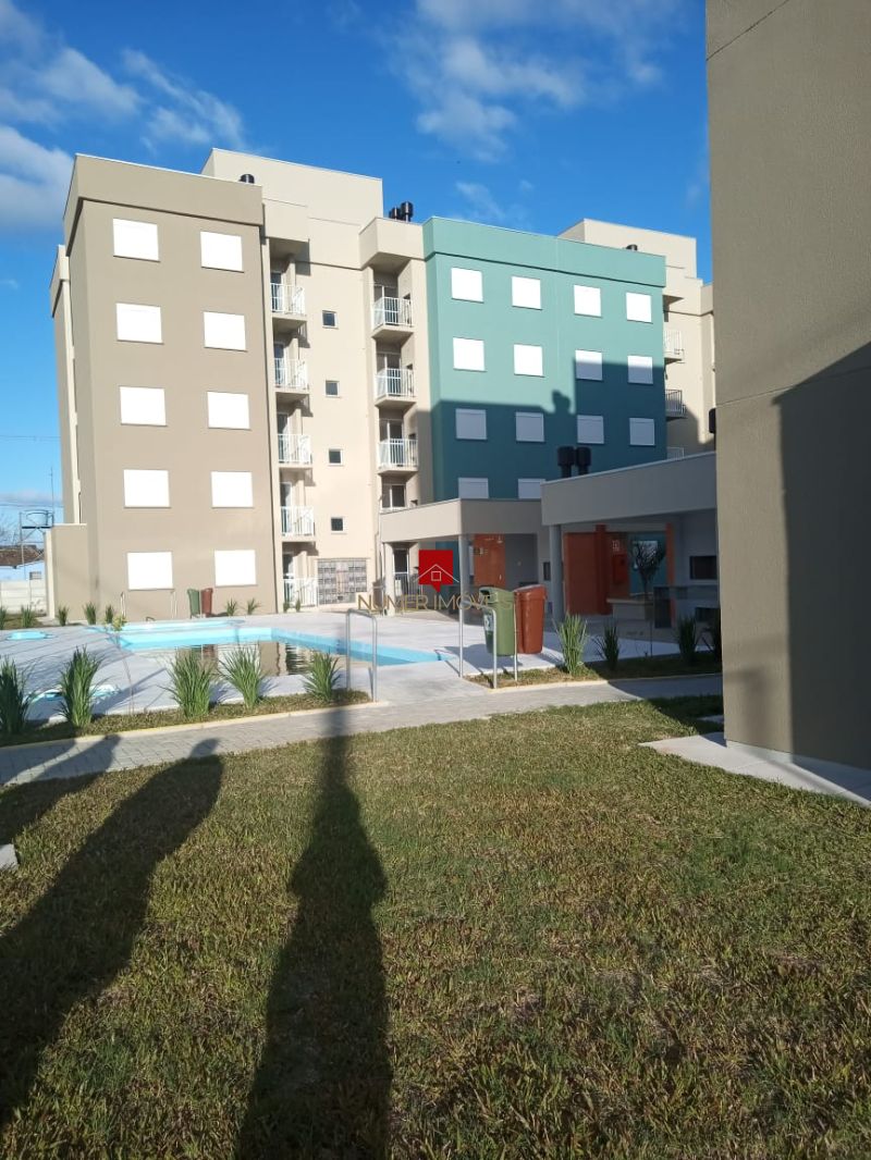 APARTAMENTO COM SACADA E CHURRASQUEIRA