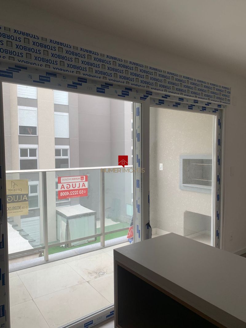 APARTAMENTO COM SACADA E CHURRASQUEIRA