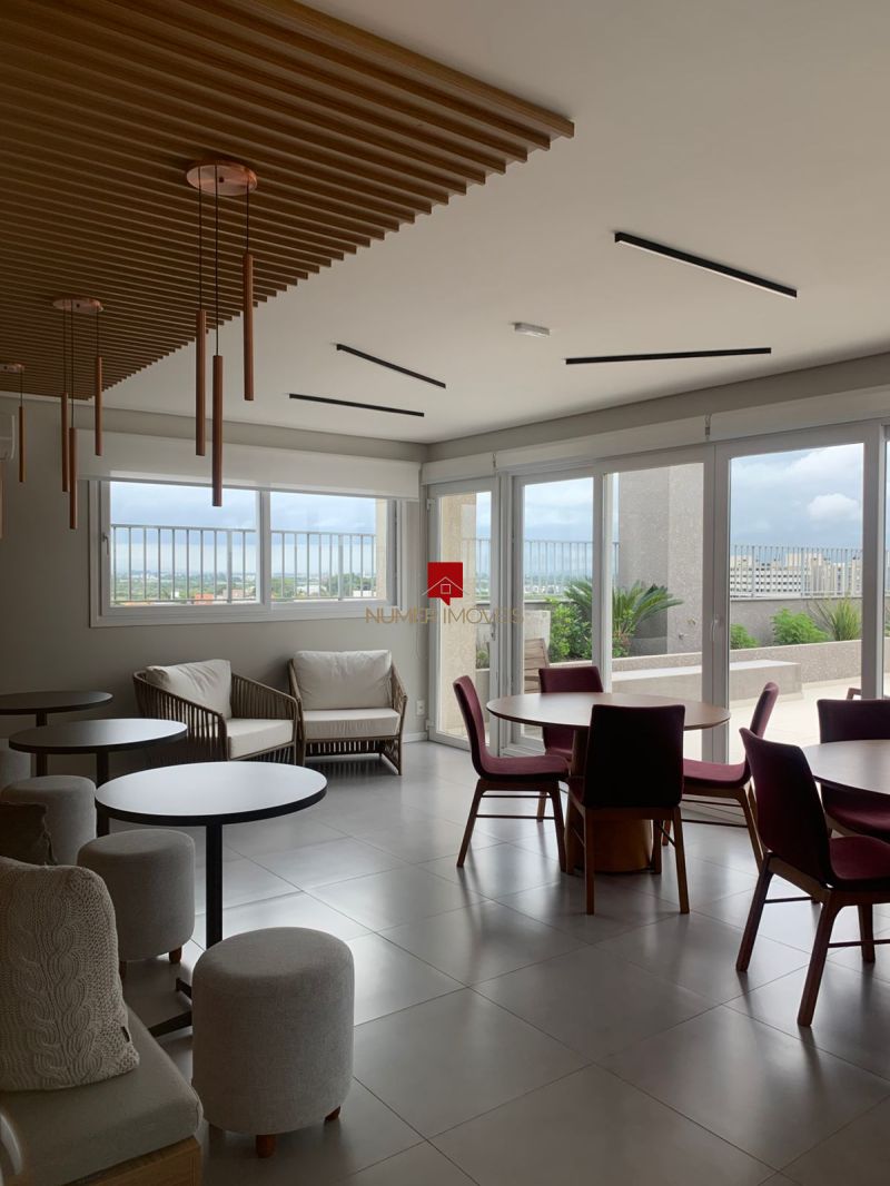 APARTAMENTO COM SACADA E CHURRASQUEIRA