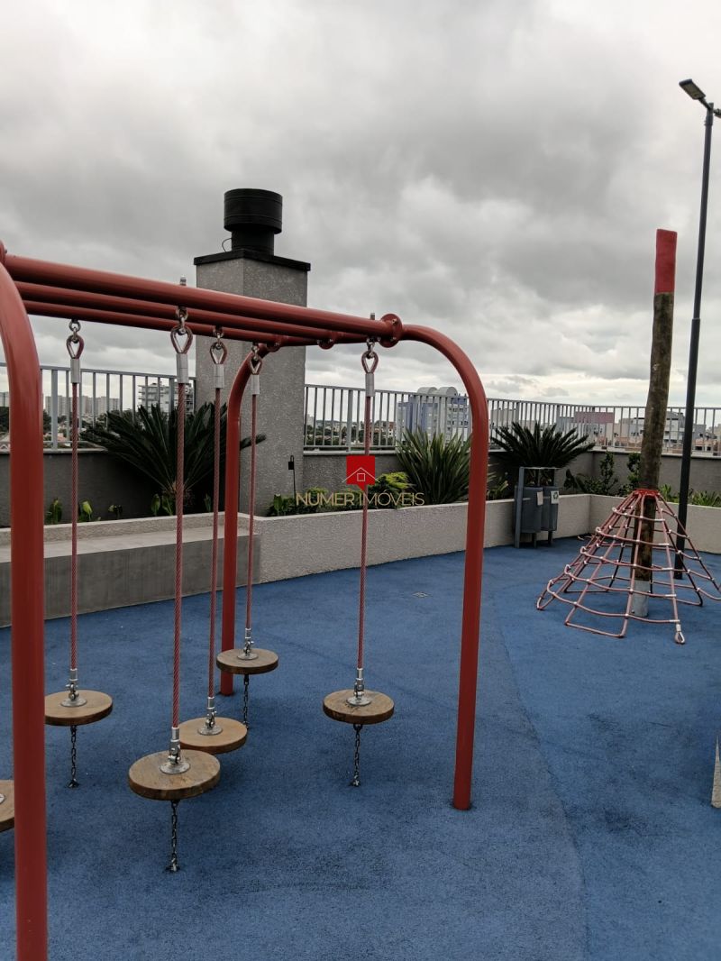 APARTAMENTO COM SACADA E CHURRASQUEIRA