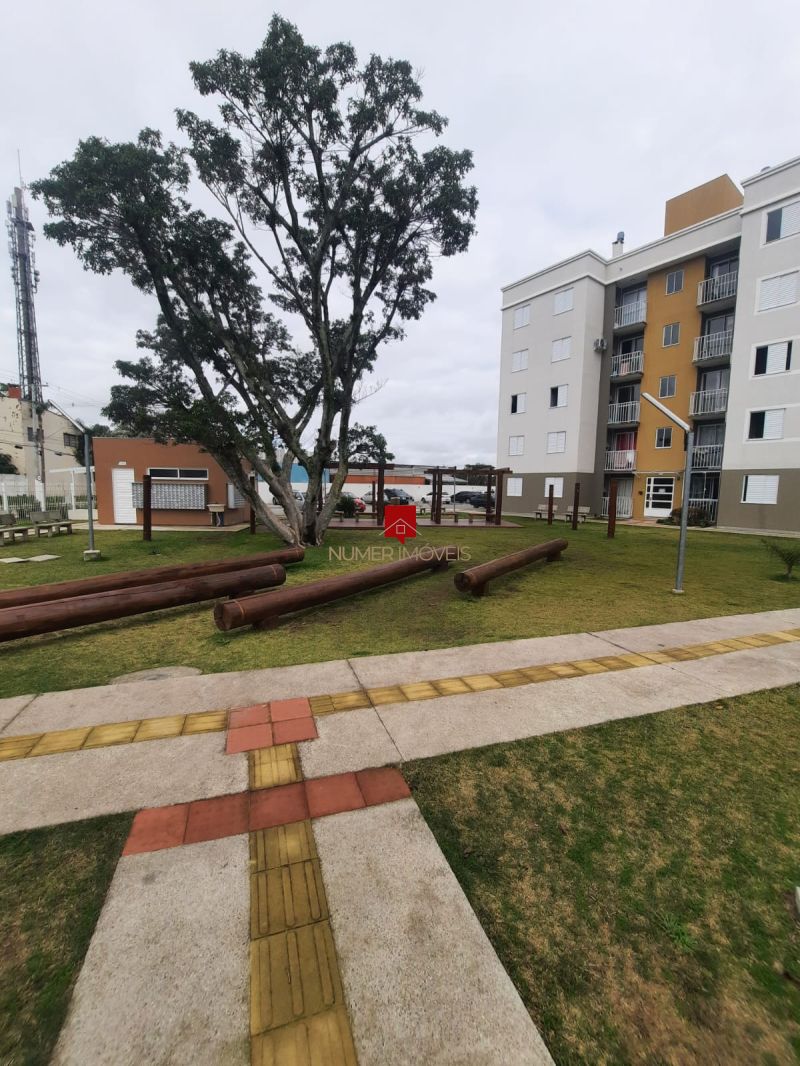 APARTAMENTO COM SACADA E CHURRASQUEIRA 